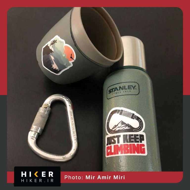 استیکر سنگنوردی با طرح کارابین، کوه و نوشته just keep climbing مناسب برای فلاسک استنلی