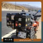 استیکر خاص دویدن با طرح کوهستان و خوسید و یک دونده زن و مرد، مناسب موتور