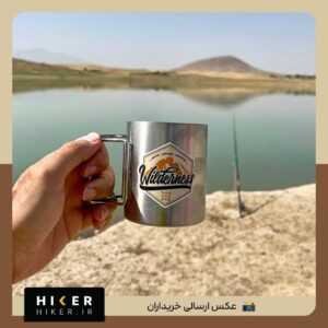استیکر ضد آب با طرح کوه و خورشید و نوشته wilderness مناسب ماگ طبیعتگردی