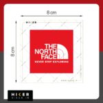 استیکر لوگوی "THE NORTH FACE"، با زمینه قرمز و نوشته سفید، مناسب برای تمام سطوح