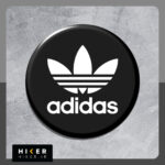 استیکر ژله‌ای لوگوی آدیداس "adidas"، با طرح دایره مشکی و نوشته سفید