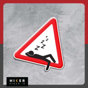 استیکر ژله ای ضد آب هشدار خواب‌آلودگی با تصویر فرد خوابیده داخل تابلوی اخطار مثلثی قرمز مناسب لپ‌تاپ و شیشه ماشین