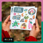 بسته استیکر با موضوع طبیعت و طرح‌های متنوع در دست یک خانم