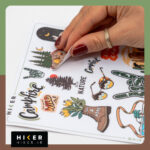 شیت استیکر ضد آب با طرح‌های کمپینگ و طبیعت‌گردی شامل جنگل، قهوه کمپ، کفش کوهنوردی و المان‌های سفر